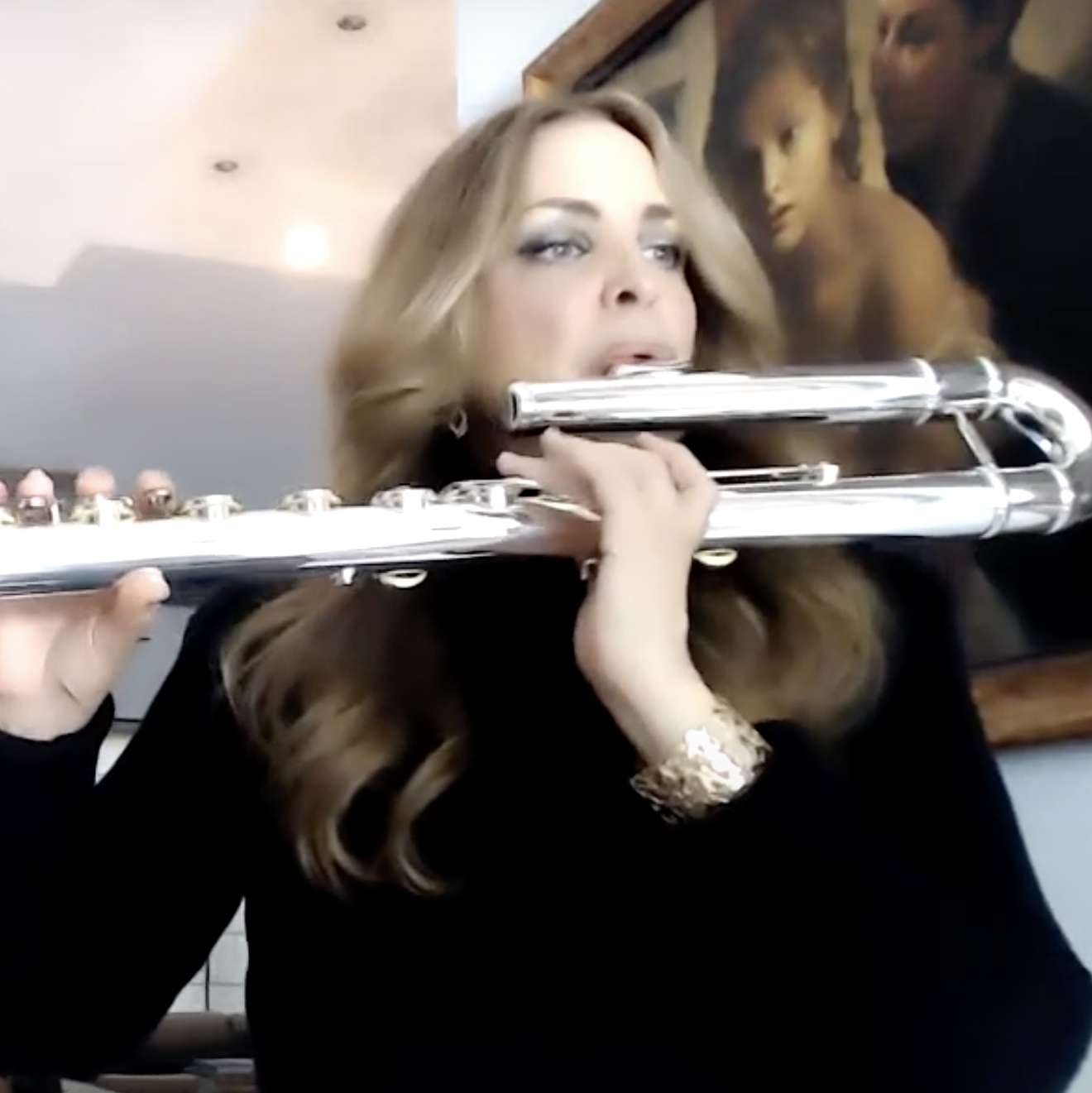 Woman playing a brass instrument